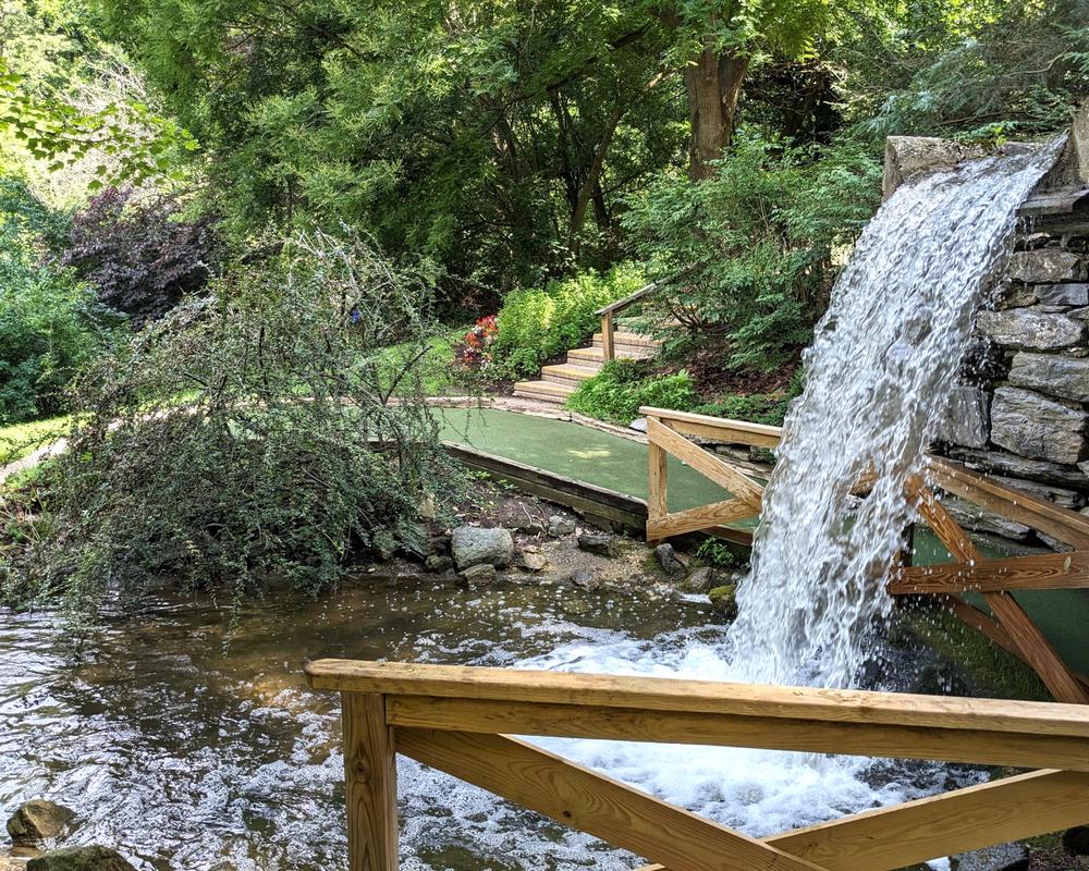 The fourteenth hole on the Gold course goes under a waterfall.