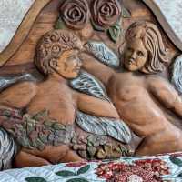 The headboard was carved by a local woodcarver.